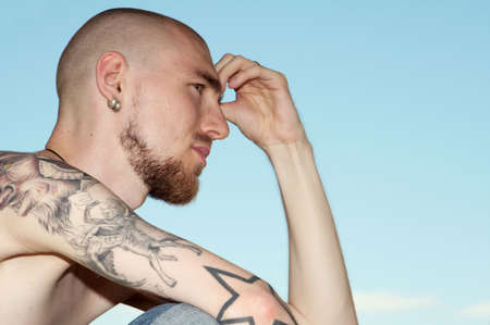 The young guy who is were fond tattooの写真素材