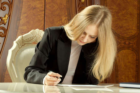 The girl on a workplace.の写真素材