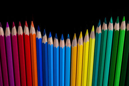 Palette of color pencils on a black background.の写真素材