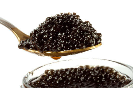 Bank with black caviar on a white background.の写真素材