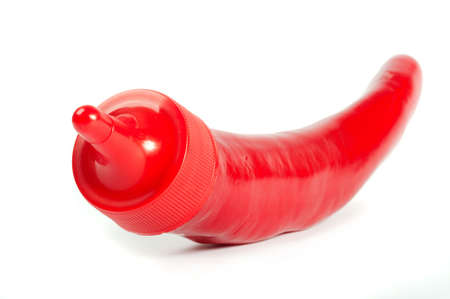 Packing of sauce from sweet pepper on a white backgroundの写真素材