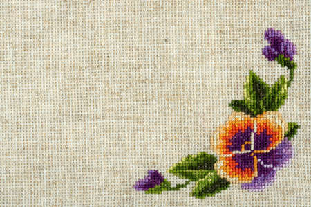 Embroidered flower  on a sample of a fabric の写真素材
