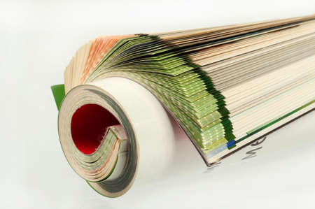 Color pages of old magazine on a white background.の写真素材