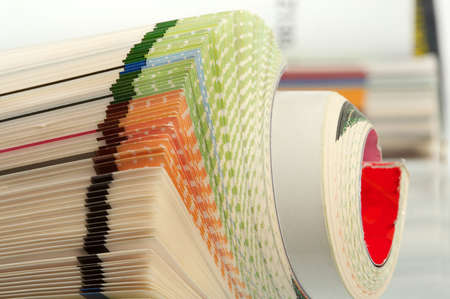 Color pages of old magazine on a white background.の写真素材