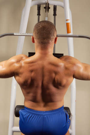 Man makes exercises for increase in force of muscles.
