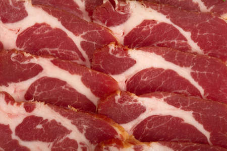 Several slices of smoked  baconの写真素材