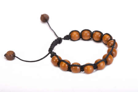 Popular Buddhist bracelet shamballa on a white background.の写真素材