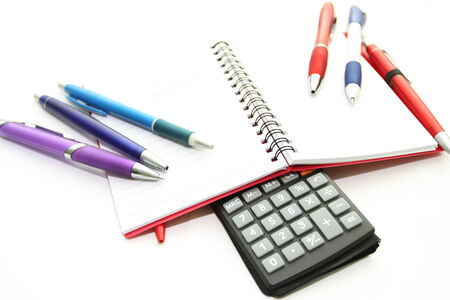 Set of office tools - handles, a notebook, a stapler, the calculatorの写真素材