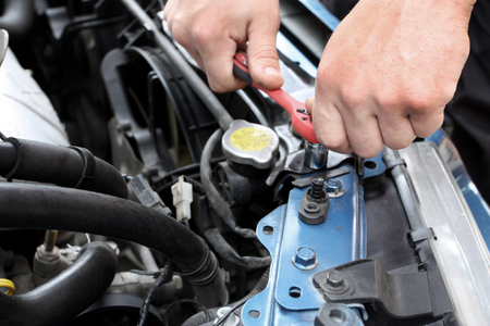 Car repairs process by means of a set of mechanical headsの写真素材