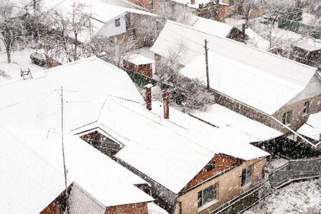 Snow winter blizzard on city streets before New yearの写真素材