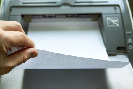 Press process on clean sheets of paper in the laser printerの写真素材