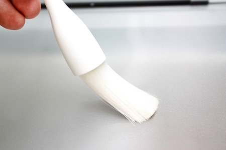 Process of cleaning of various surfaces by a plastic brush