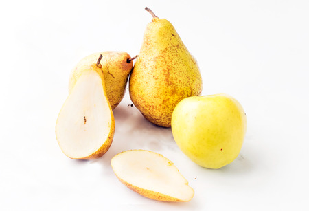 Fresh, juicy apples and pears on a white backgroundの写真素材