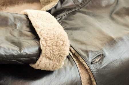 Texture - the Leather natural sheepskin coat of black color with furの写真素材