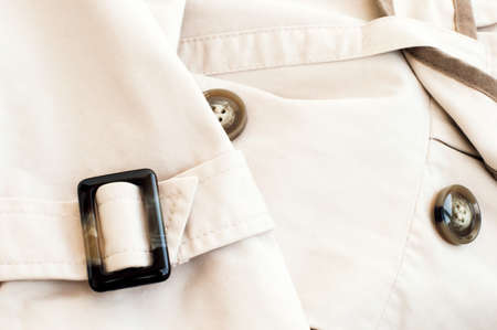 Texture - a white women's coat with inserts of coffee colorの写真素材