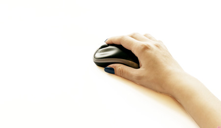 The process of manipulating electronic mouse for laptop on white backgroundの写真素材
