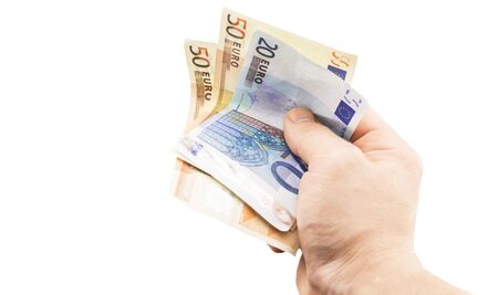 Banknote in denomination of 50  and 20 euro in  hand on a white background