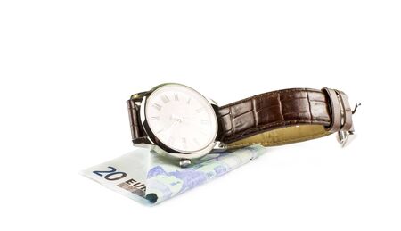 Watches and Euro banknote on a white background