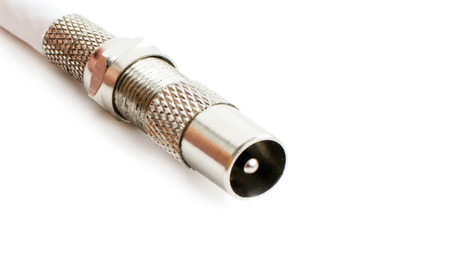 Coaxial cable with adapter for broadcast television on a white backgroundの写真素材