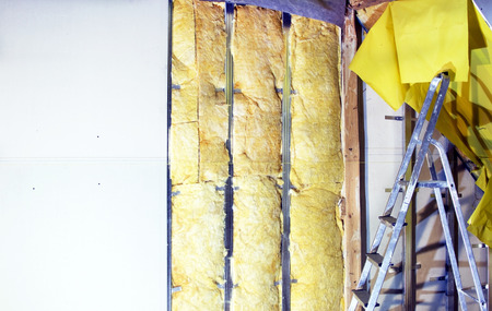 Installation  walls  with plasterboard and mineral wool for thermal insulation