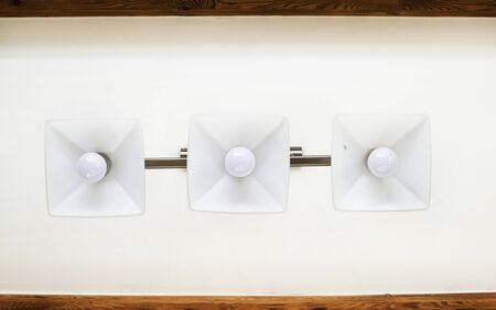 Design ceiling with chandeliers in the room of a country houseの写真素材