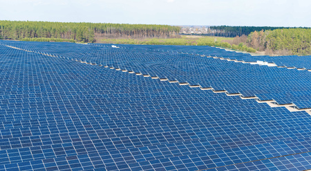 A large number of rows of solar panels sections - top view