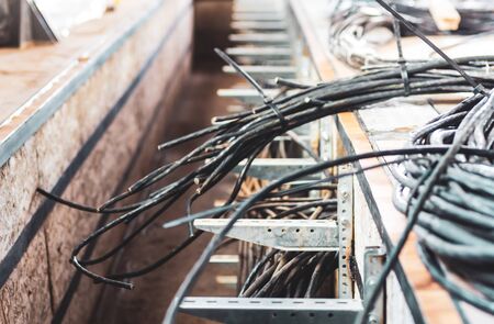 Plenty of cables laid in the relay room on the power substationの写真素材