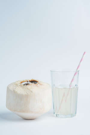 Fresh coconut and coconut milk in trasparent glass.の写真素材