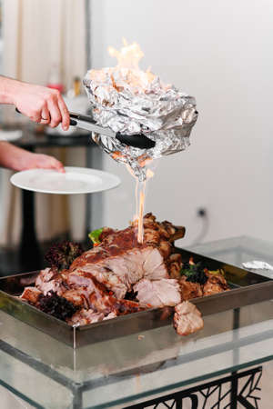 Chef preparing baked Turkey on a platter in the fire. Roast Turkey.の写真素材