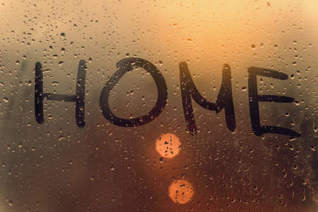The inscription home on the sweaty glass.の写真素材