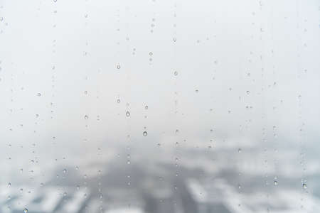 Water drops on window glass after rain.の写真素材