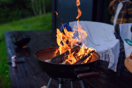 Bbq grill flame, hot burning grill outdoors cooking food. Grill burning fire for barbecue cooking outdoors.の写真素材