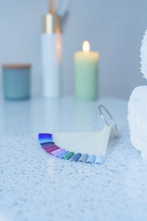 Nail polish colours on manicure palette. Nails art accessories.の写真素材
