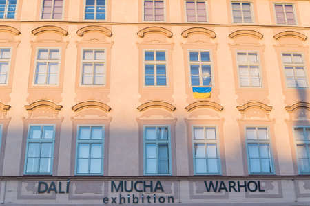 Prague, Czech Republic - 03.28.2022: An Ukrainian flags is hung in support of Ukrainians protecting...