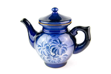 Blue ceramic teapot on a white backgroundの写真素材