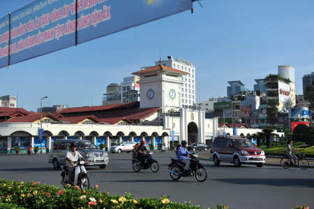 HO CHI MINH, VIETNAM - OCTOBER 29, 2014: People go to work by motorcyclesのeditorial素材