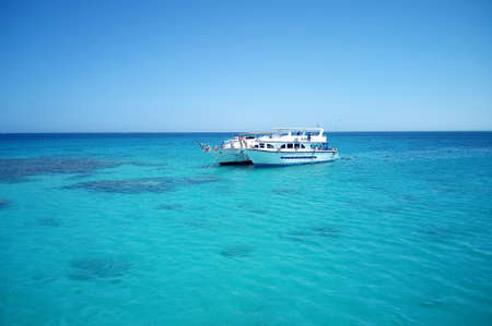 Hurghada, Egypt - August 15, 2015: Here comes a lot of tourists on yachts and boats to swim, sunbathe, go diving and have a good timeのeditorial素材