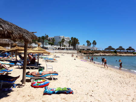 Hammamet, Tunisia - July 25, 2017: People relax on the beach of hotel Club Novostar Sol Azur Beach Congres.のeditorial素材