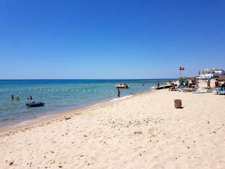 Hammamet, Tunisia - July 25, 2017: People relax on the beach of hotel Club Novostar Sol Azur Beach Congres.のeditorial素材