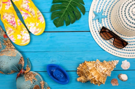 Traveler accessories with empty space for text. Travel vacation concept. Summer background. Beach fashion , summer concept. Road frame set. Flat lay, top viewの写真素材