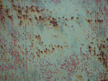 Grunge rusted metal texture. Rusty corrosion and oxidized background. Worn metallic iron panel.の写真素材