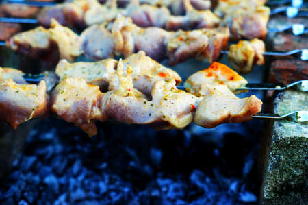 Skewers on skewers are grilled on the grill. delicious beef bbq on grillの写真素材