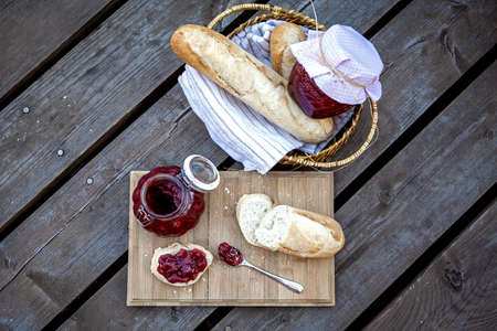Baguette with strawberry jamの写真素材