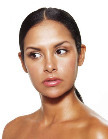 Portrait of beautiful young latin woman on white backgroundの写真素材
