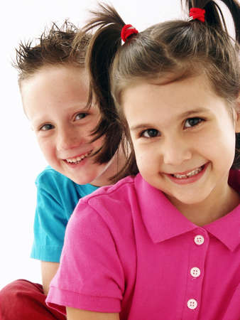 Two happy children on white backgroundの写真素材
