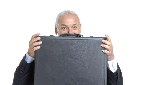 Senior man in suit with briefcaseの写真素材