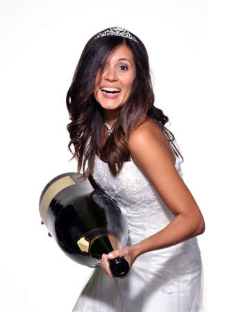 Bride holding a bottle of champagneの写真素材