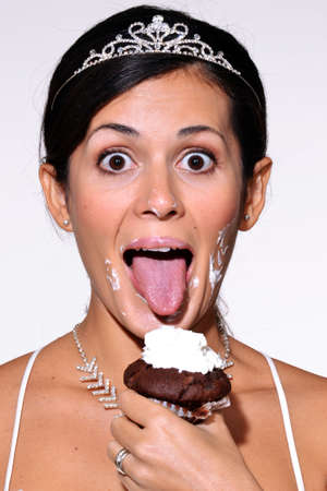 Bride eating cakeの写真素材