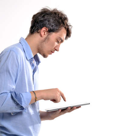 Man playing with tabletの写真素材