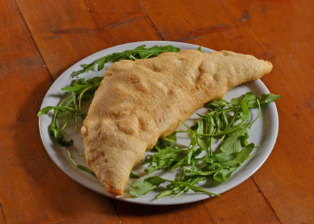 Calzone pizza. Fried pizzaの写真素材